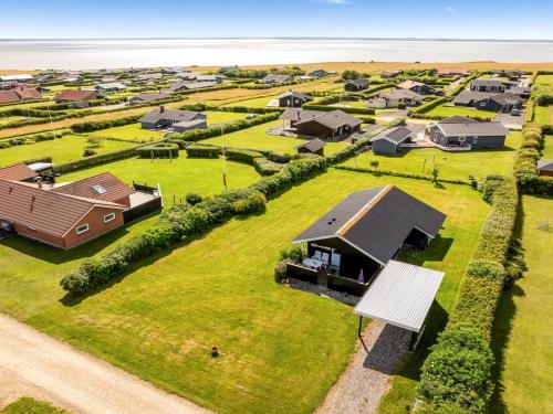 an aerial view of a farm with houses at Holiday Home Pavo - 300m to the fjord by Interhome in Vinderup