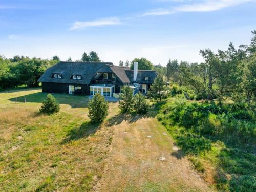 an aerial view of a house on a field at Holiday Home Gertrudis - 2km to the fjord by Interhome in Frøstrup