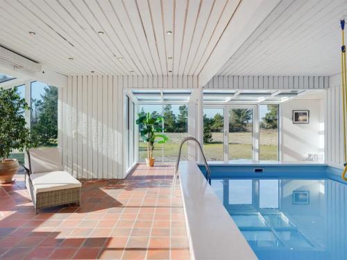 a swimming pool in a house at Holiday Home Gertrudis - 2km to the fjord by Interhome in Frøstrup