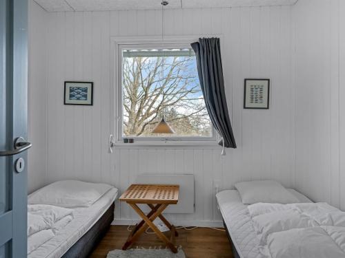Postel nebo postele na pokoji v ubytování Holiday Home Thyra - 500m to the fjord by Interhome