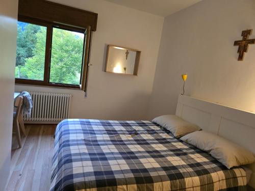Postel nebo postele na pokoji v ubytování Al Belvedere sul Piave