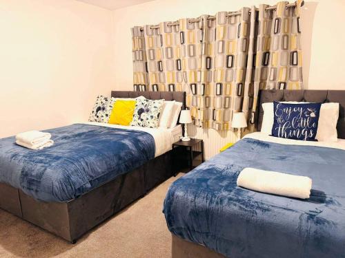 Postel nebo postele na pokoji v ubytování Modern Easedale House - 3 Bed House in Hornchurch