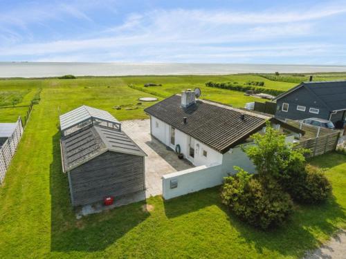an aerial view of a house and a yard at Holiday Home Gundborg - 100m from the sea by Interhome in Storvorde