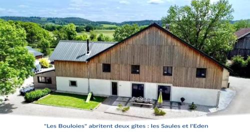 an aerial view of a large wooden barn at Les Bouloies - 2 gites familiaux l'Eden et les Saules - in Laviron