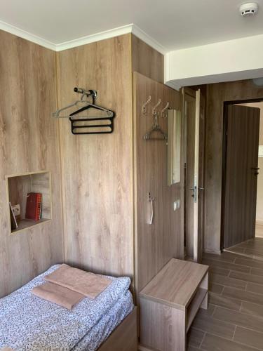 Postel nebo postele na pokoji v ubytování Каприз