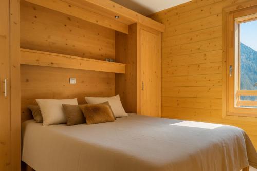 Katil atau katil-katil dalam bilik di Crépines Appartement 2 à 4 personnes au pied des pistes