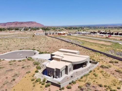 an aerial view of a building in the desert at Luxury Desert Oasis in Kanab Near Zion Family in Kanab