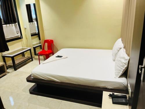 Una cama o camas en una habitación de Puja specail
