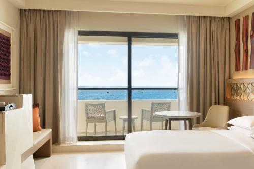 Postel nebo postele na pokoji v ubytování Hyatt Ziva Cancun All-Inclusive