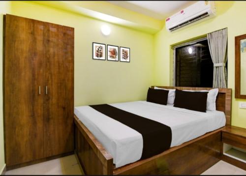 Postel nebo postele na pokoji v ubytování Ruposhi bangla guest house