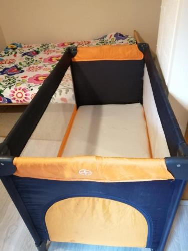 a bed in a room with a bed frame at CHEZ YAYA Bogumiła Szeląg in Zalasowa
