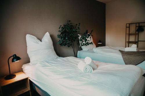 Gemütliche 2-Zimmer-Wohnung in Fürstenwalde an der Spreeにあるベッド