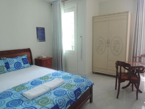 Postel nebo postele na pokoji v ubytování Hotel Khoa Văn