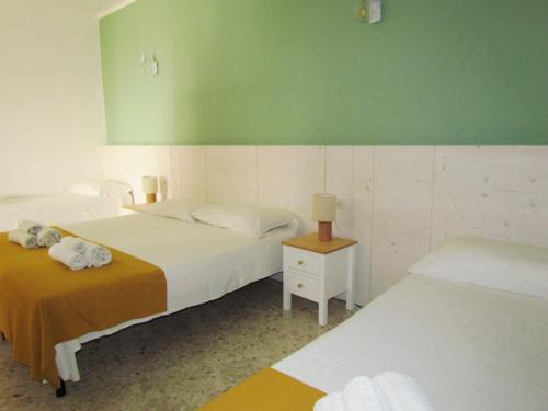 Postel nebo postele na pokoji v ubytování Arco Michele