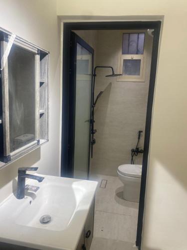 a bathroom with a sink and a toilet at سندباد in Riyadh