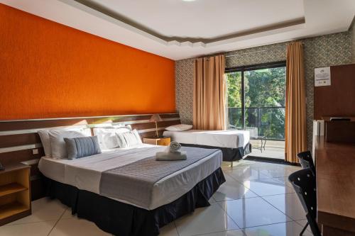 Ένα ή περισσότερα κρεβάτια σε δωμάτιο στο Hotel Green Hill