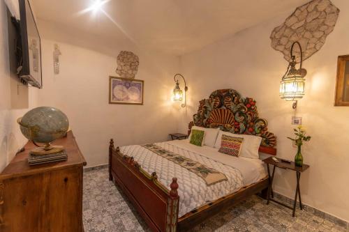 Ένα ή περισσότερα κρεβάτια σε δωμάτιο στο Hotel Villa Peñasco