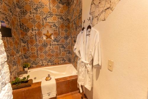 Ένα μπάνιο στο Hotel Villa Peñasco