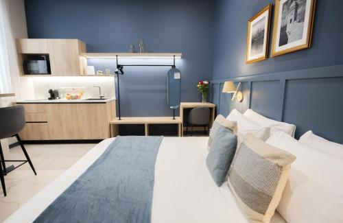 Postel nebo postele na pokoji v ubytování Buena Vista Suites
