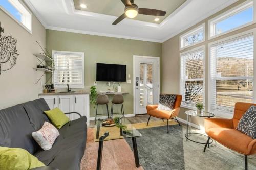 a living room with a couch and chairs and a tv at Byrd 6 Cozy Byrd Nest in Owens Cross Roads