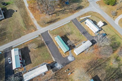 an aerial view of a parking lot with buses at Byrd 6 Cozy Byrd Nest in Owens Cross Roads