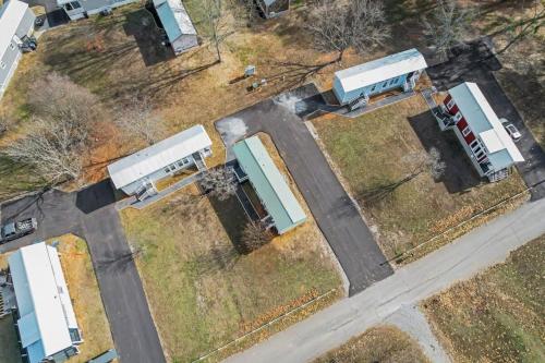 an aerial view of a parking lot with two buses at Byrd 6 Cozy Byrd Nest in Owens Cross Roads