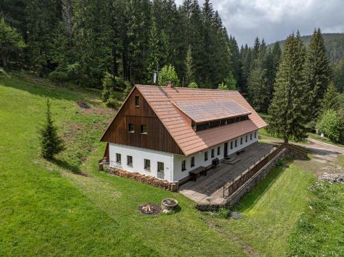 an aerial view of a house with a solar roof at Bouda Pavlovka in Dolní Malá Úpa