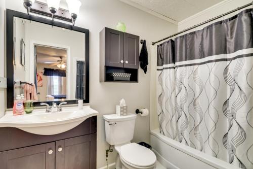 a bathroom with a sink and a toilet and a shower at Home Less Than 3 Mi to Rte 66 and Lake Lou Yaeger! in Litchfield