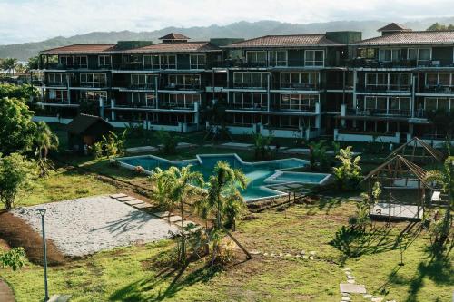 an aerial view of a resort with a swimming pool at Cozy & Comfy 2BR Villa 7 at Playa Venao in Playa Venao