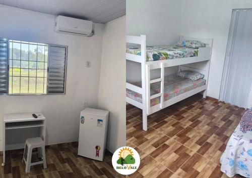 een slaapkamer met twee stapelbedden en een bureau bij Pousada e Pesqueiro Belo Vale in Juquiá