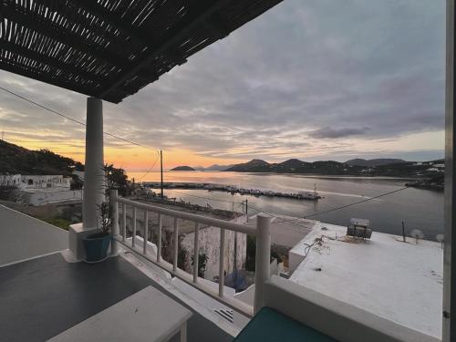 a balcony with a view of a body of water at Bella Vista in Panteli