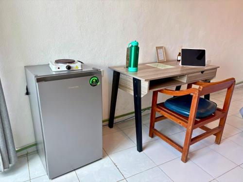 Dapur atau dapur kecil di Hostal Cuca Macuca