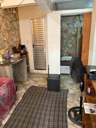 Ruang duduk di Casa Rústica simples