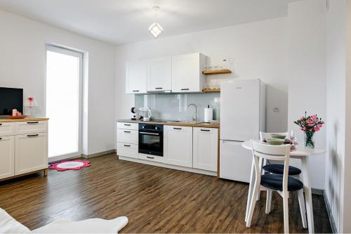 Η κουζίνα ή μικρή κουζίνα στο Apartament Różany