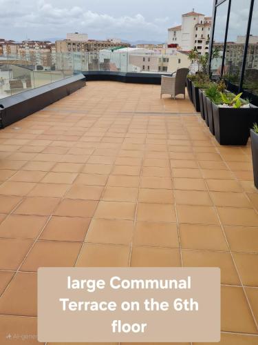 a large communal terrace on the floor at Lovely Central studio king bed in Gibraltar