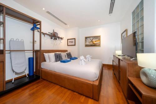 Katil atau katil-katil dalam bilik di Nai Thon beachfront apartment by Lofty