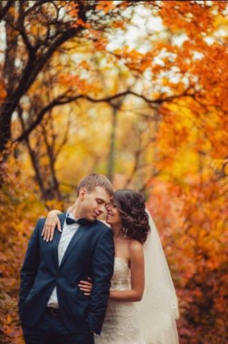 a bride and groom standing next to each other at Log Home w Mountain Views Near Windham & Hunter Ski Resorts in Maplecrest