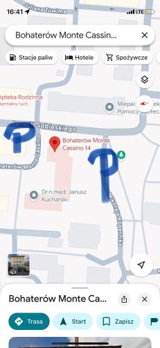 a screenshot of a cell phone with a map at Monte Cassino Apartament in Oświęcim
