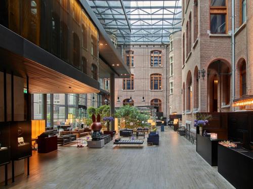 Χώρος καθιστικού στο Conservatorium Hotel