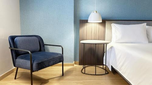 Postel nebo postele na pokoji v ubytování Hotel Habitel Select