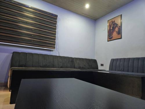 a conference room with a table and two chairs at We a in Port Harcourt