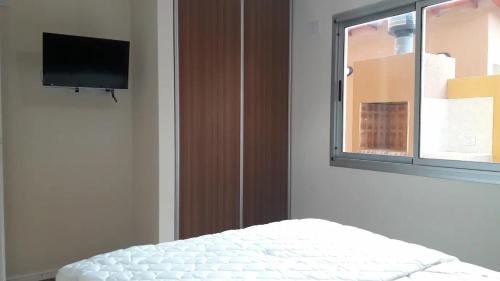 Postel nebo postele na pokoji v ubytování ACQUA Apartamentos de Mar