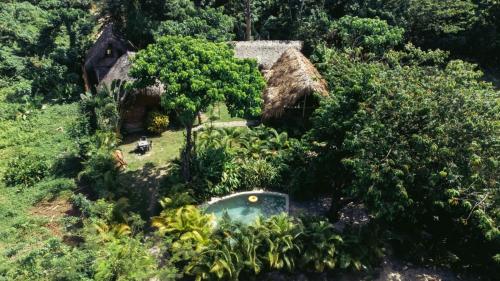 Zahrada ubytování Bungalows India, El Valle, Samana