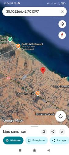 a screenshot of a cell phone with a map at Karyat arkman nador in Nador