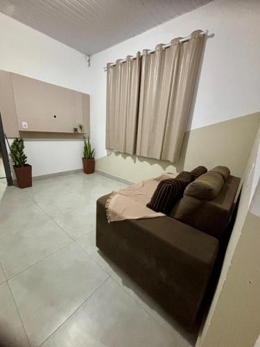 Χώρος καθιστικού στο Casa GZ - Quarto 01 - Ideal para quem vem a Sinop a trabalho!