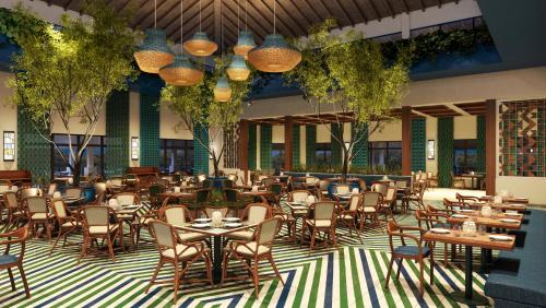 Un restaurante u otro lugar para comer en Dreams Dominicus La Romana Resort & Spa
