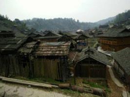 a group of roofs of houses in a village at Bridge View Boutique Guesthouse 望桥楼精品民宿 in Sanjiang