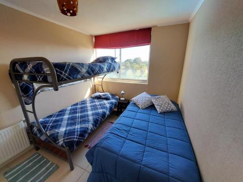 Voodi või voodid majutusasutuse Depto Laguna Vista Algarrobo toas