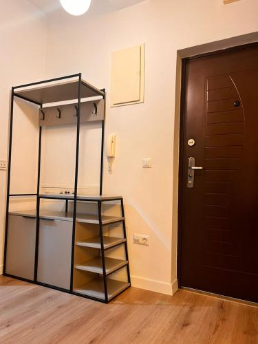 a room with a bunk bed and a door at Modern City 1BR in the best location Ferizaj in Ferizaj