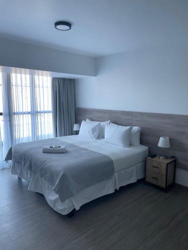 Katil atau katil-katil dalam bilik di Urban Suites Apart Hotel